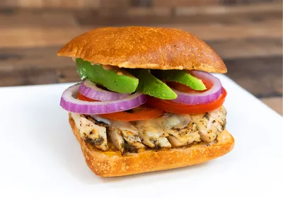 Ciabatta bread, chipotle aioli, chicken, provolone cheese, avocadoes, tomatoes, red onions, spring mix