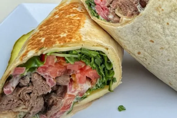 Soft flour tortilla, house made garlic aioli, juicy filet mignon, baby arugula, and creamy havarti cheese, pickled onions, juicy tomatoes bring a burst of tangy freshness