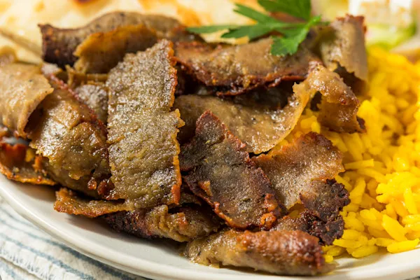 Flame-Broiled, hand-carved Gyro Meat