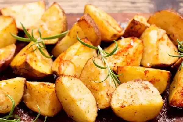 Side dish crafted with tender, golden fluffy and crispy potatoes marinated in a vibrant blend of fresh garlic, aromatic parsley, and rich olive oil. Seasoned to perfection with sea salt and cracked black pepper.