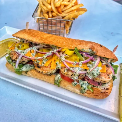 Jumbo shrimp marinated house garlic and pepper sauce, romaine lettuce, pepperoncini’s, tomatoes, Vermont cheddar cheese and cilantro garlic house sauce on a toasted hoagie roll