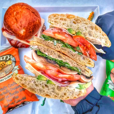 Ciabatta bread, garlic aioli, grilled portobello mushroom, havarti cheese, avocado, tomatoes, grilled onions, arugula