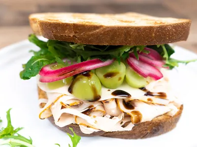 Wheat bread, garlic aioli, turkey, provolone cheese, green grapes, pickled red onions, balsamic glaze, spring mix, sprouts