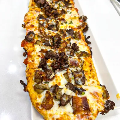 Roasted garlic tomato sauce, mozzarella cheese, filet mignon, bacon, sausage.